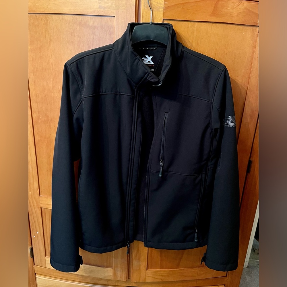 Black ZeroXposure men’s jacket size S, finished with water resistant fabric.